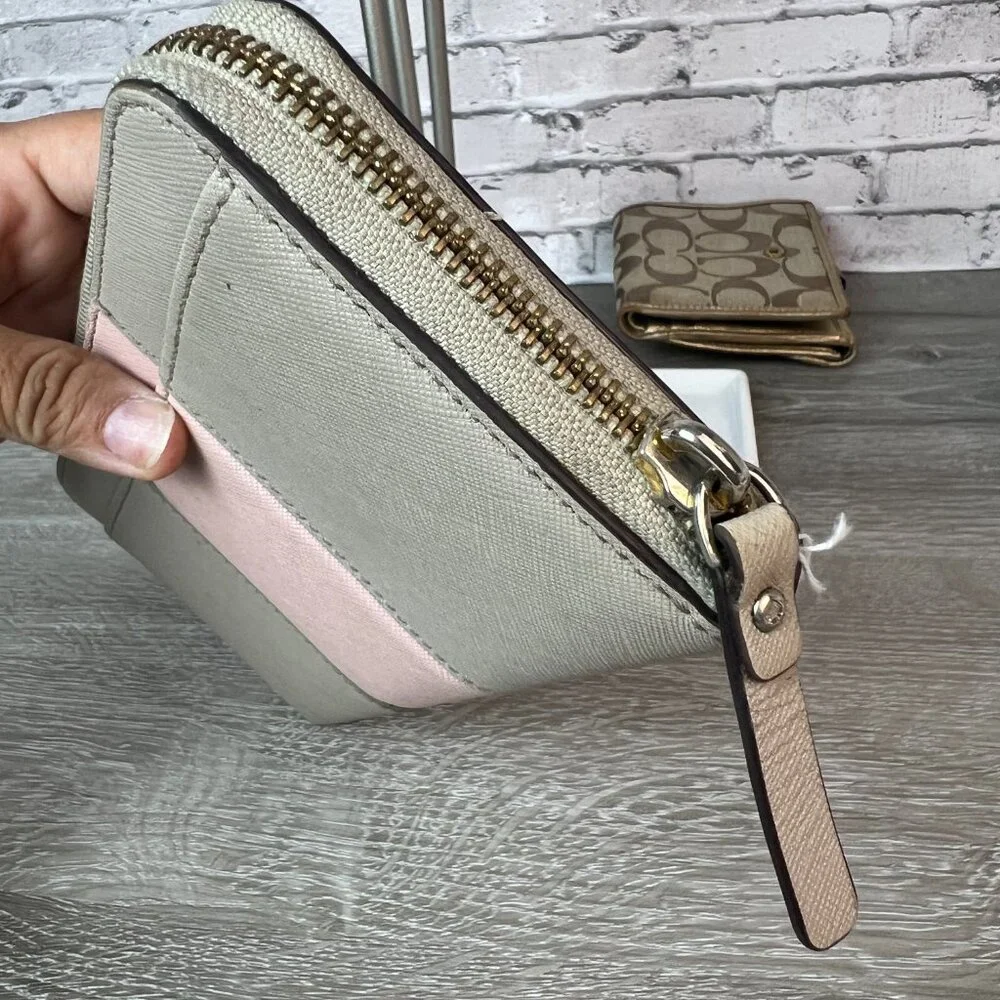 Kate sapde Accordion zip around wallet clutch